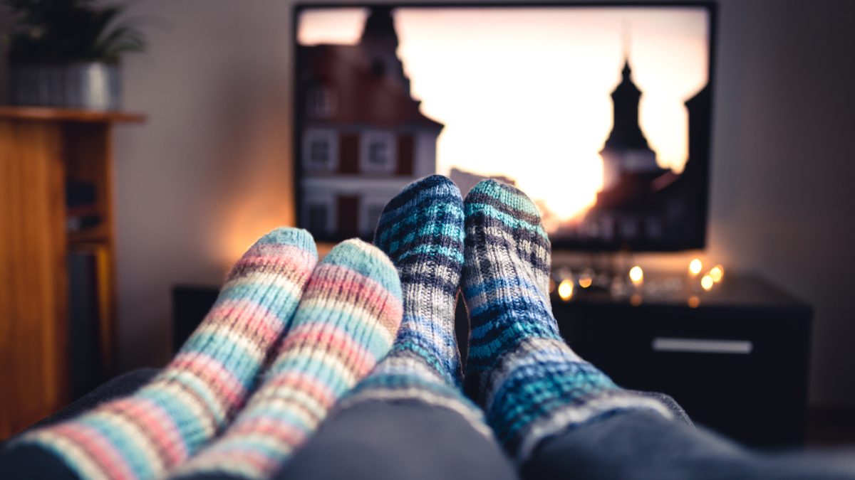 pair of feet covered in warm socks